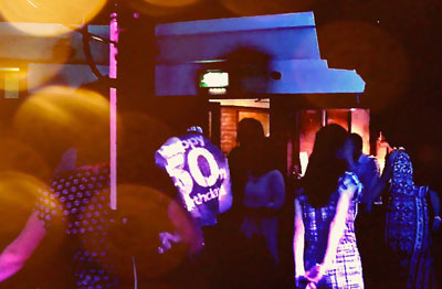 Photo of a projection showing Happy 50th Birthday