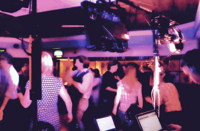 Photo of people dancing at a birthday party with DJ Nick Arkell